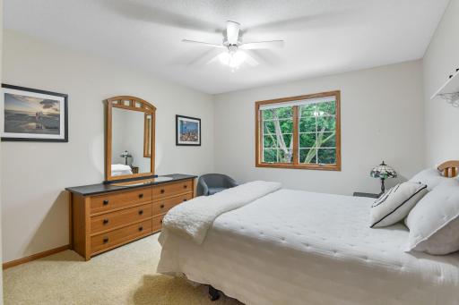 the 3rd bedroom on the upper level features a great backyard view