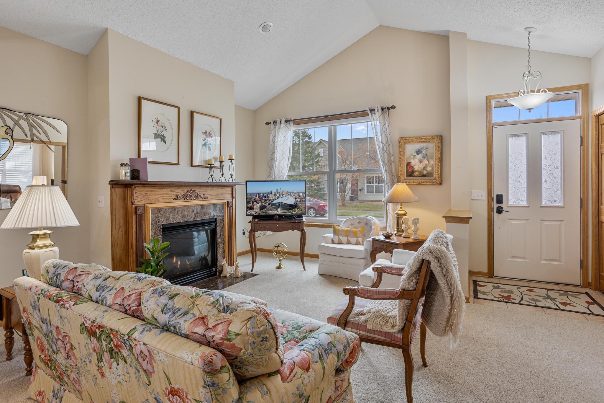 The vaulted cieling and gas fireplace make the living room a cozy place for gathering with your family and friends.