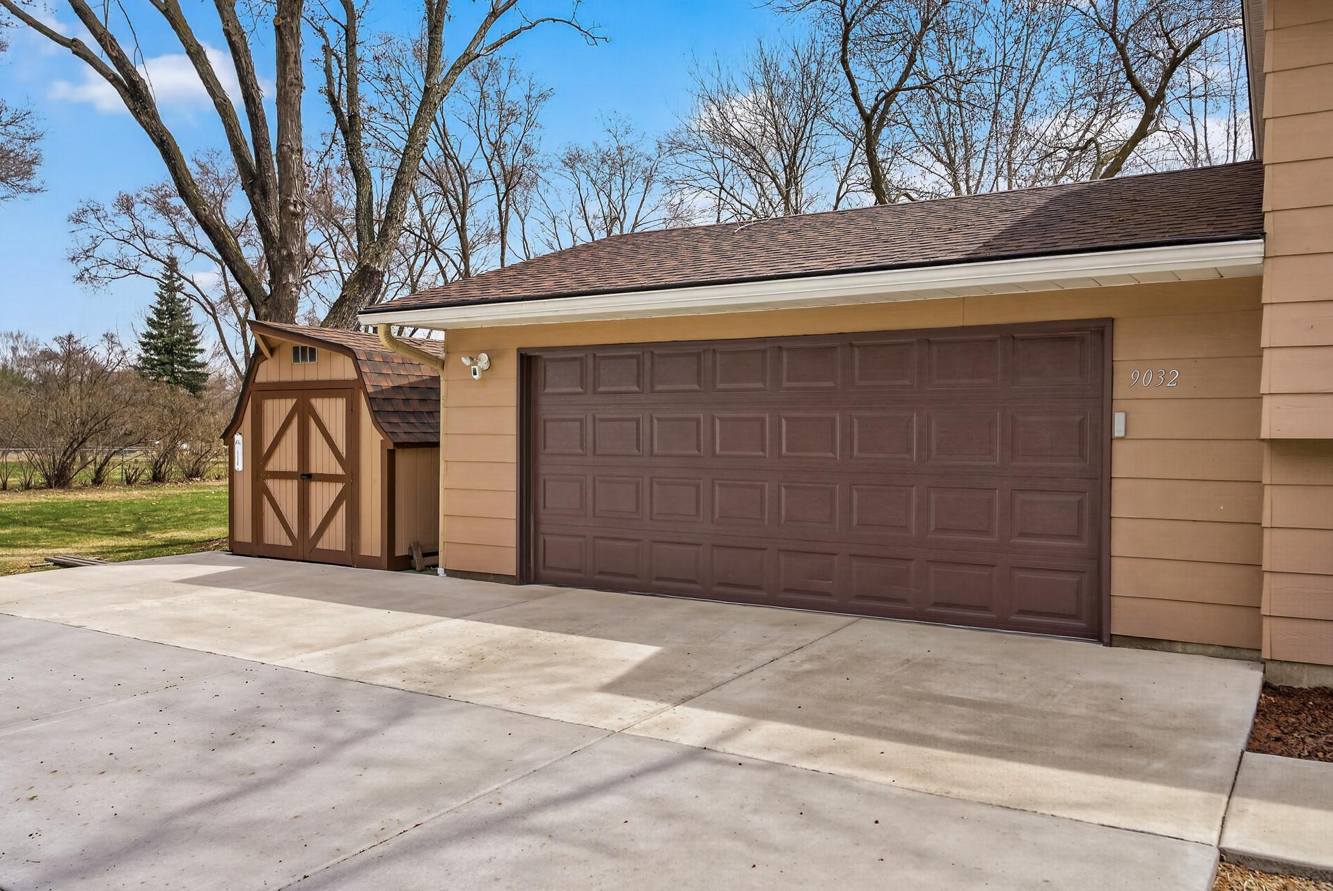 2 car attached garage & storage shed.jpg