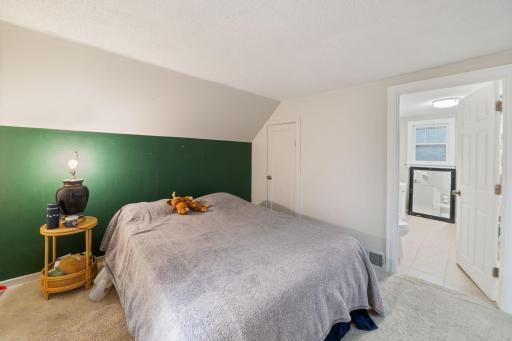 Upstairs with the Primary Suite with attached bathroom, very rare in this year of home.