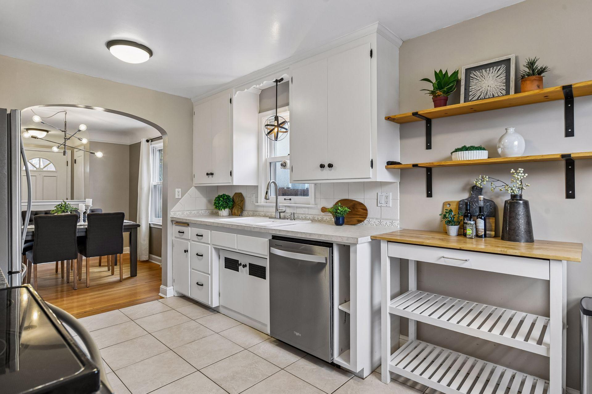 . The spacious kitchen, dining room, living room, two bedrooms, and a full bathroom complete the main floor.