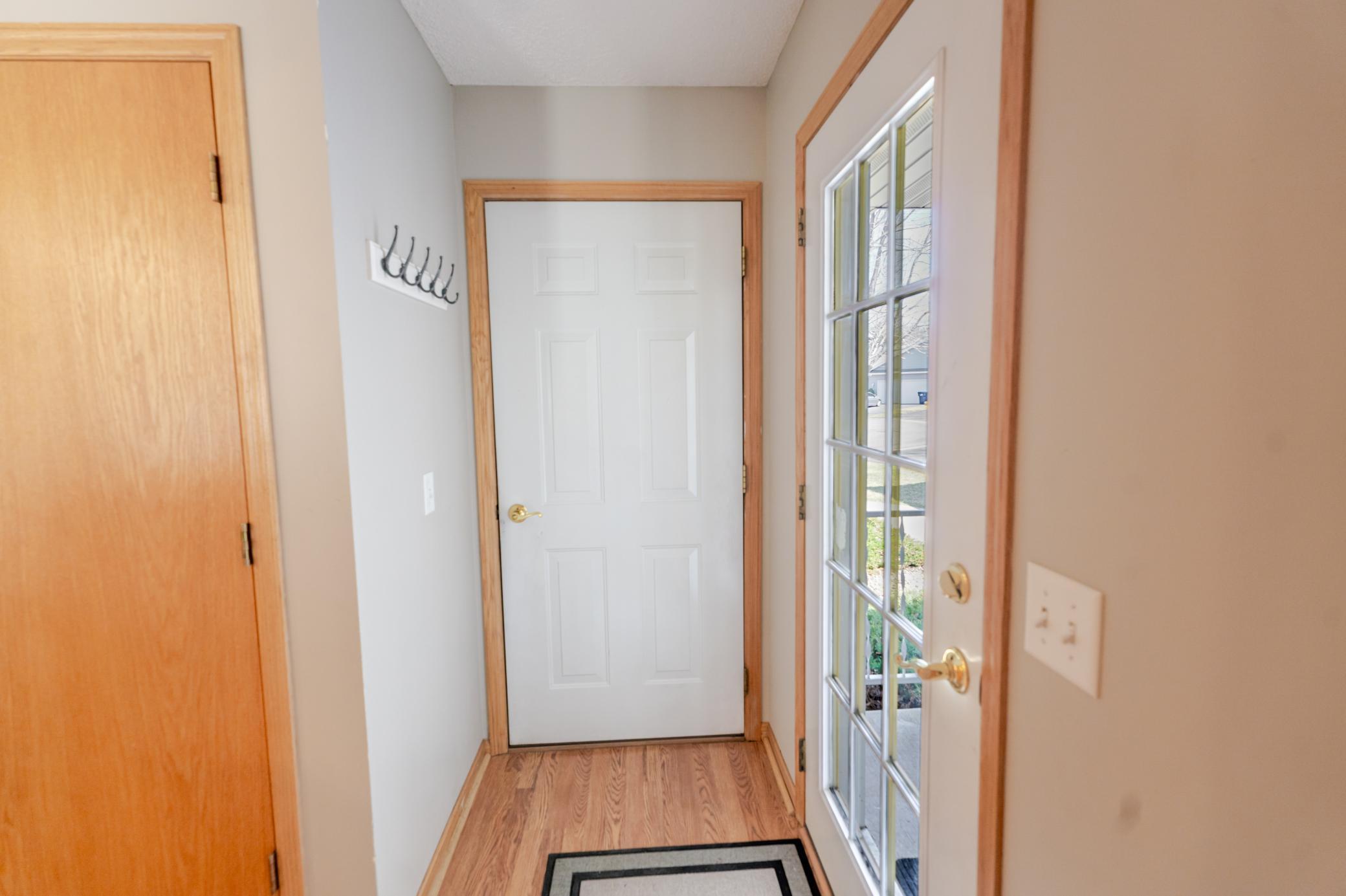 Front door and access to garage