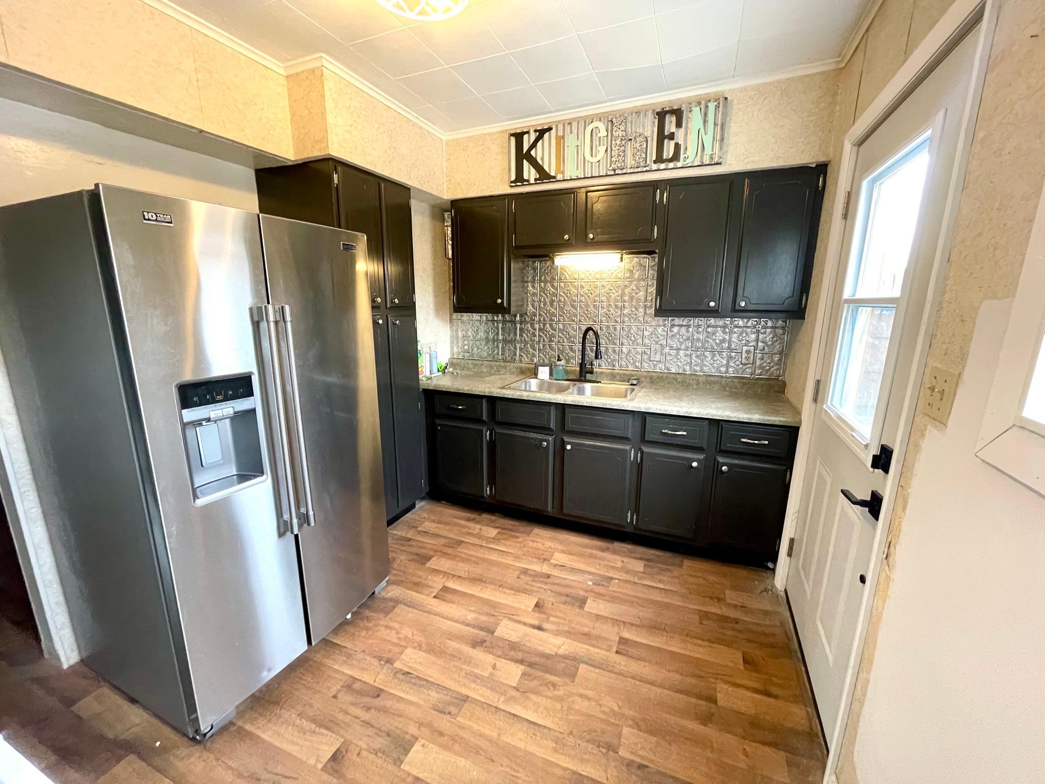 Refrigerator and stove are included in the sale