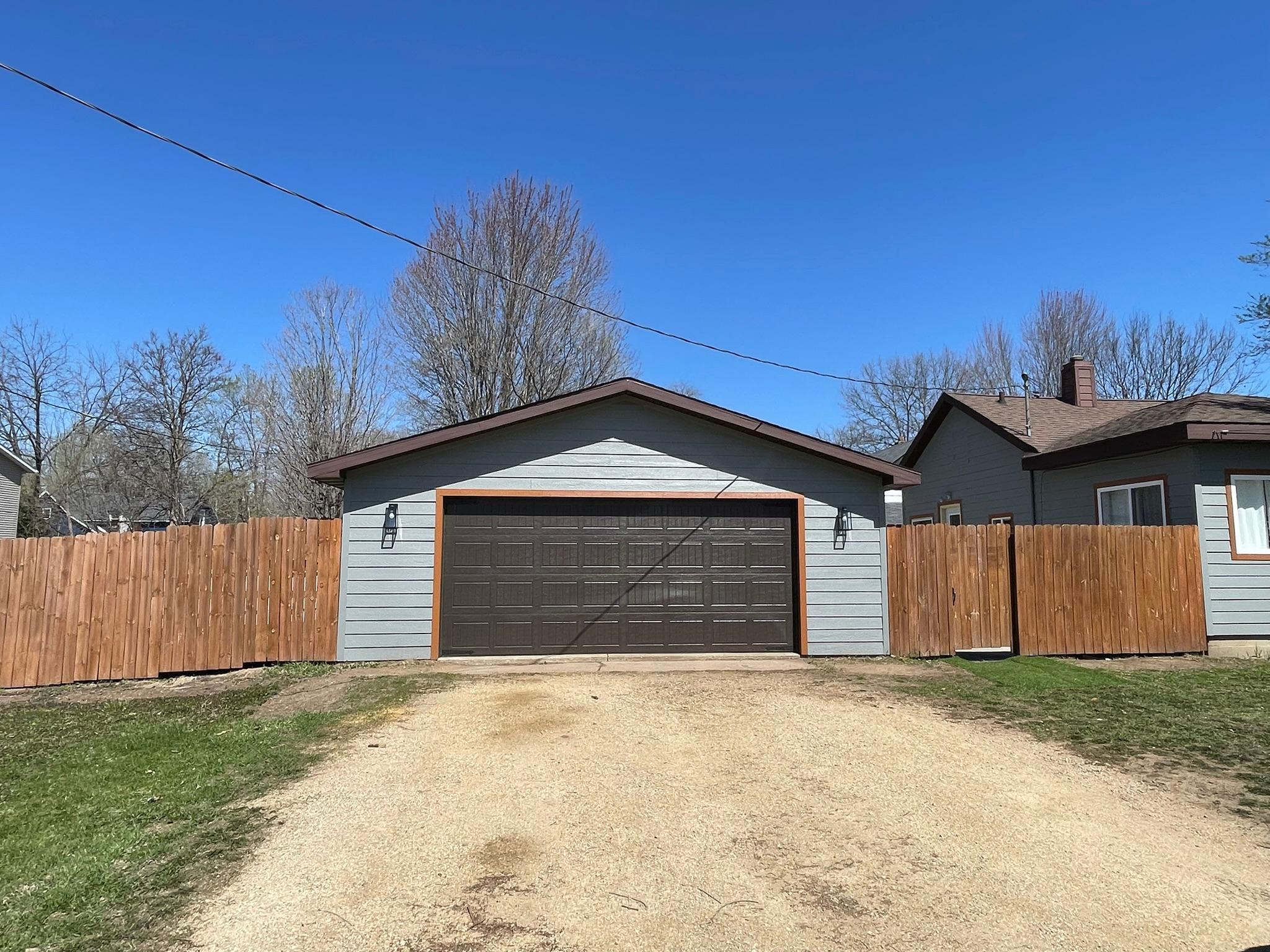 24 ' x 24 detached garage w/newer garage door and nicely fenced backyard for privacy! Convenient to back out to 19th Ave NOT 9th Street. Spacious driveway for guests to visit!