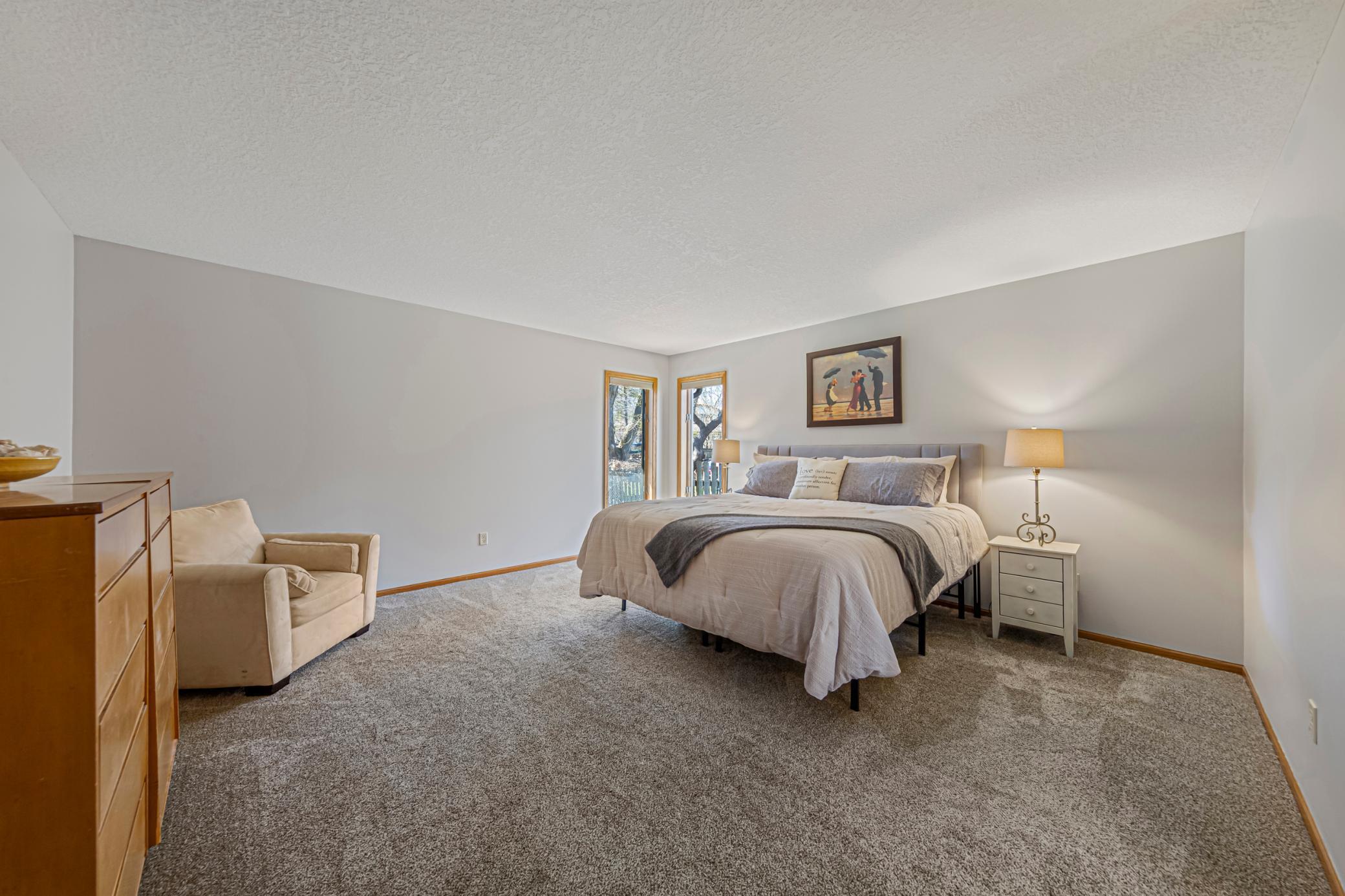 Primary Bedroom/Main Level/Private Bath/WI Closet.jpg