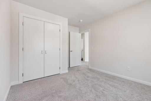 Well-sized 2nd bedroom featuring new carpeting, generous closet space, and clean, modern finishes. Functional layout for everyday living.
