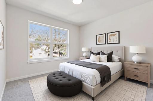Virtually Staged! Bright upper-level 2nd bedroom with large window bringing in natural light and comfortable carpeting throughout. Ideal for guests, kids, or home office use.