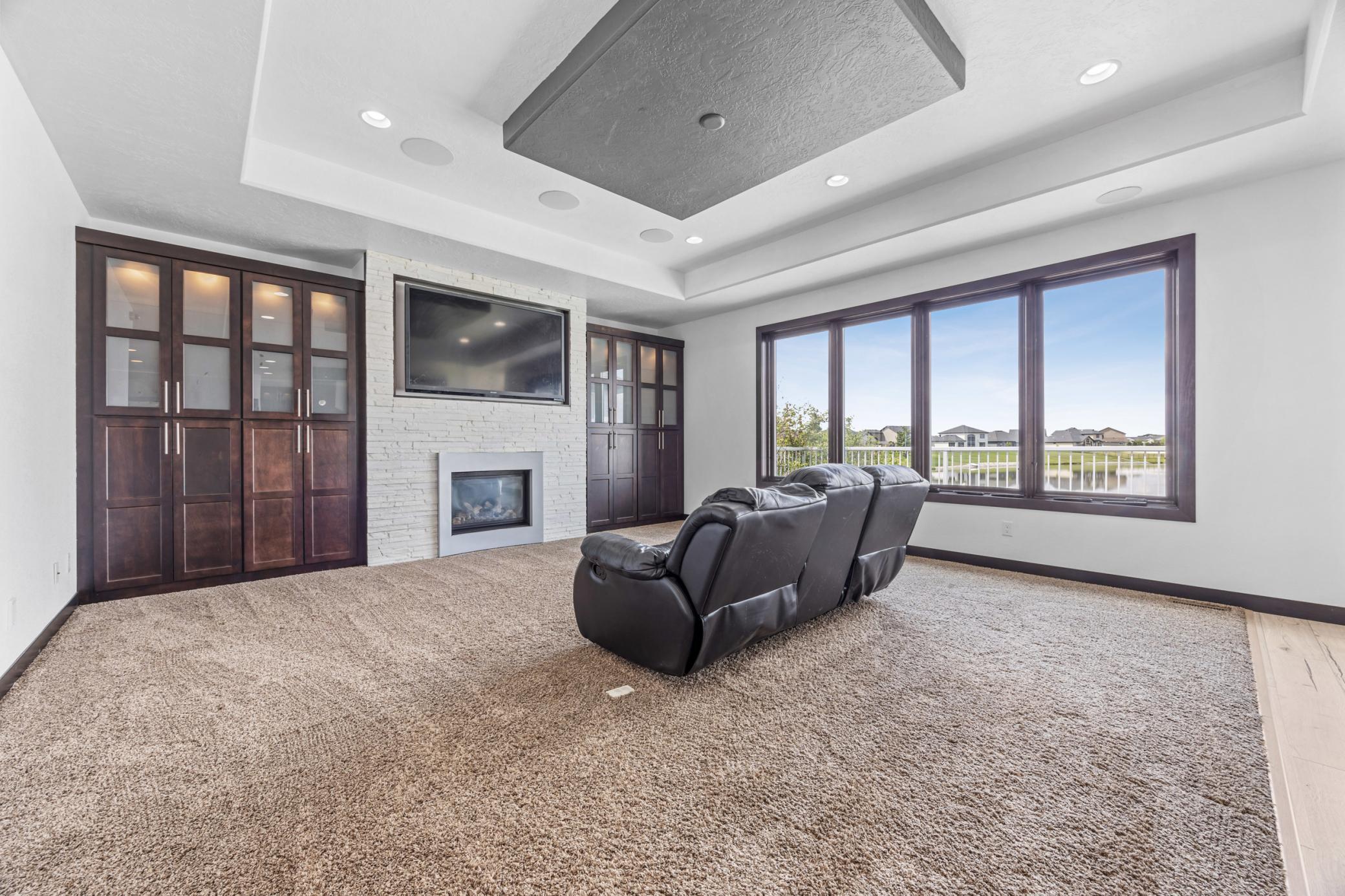 Living Room w/ Built-Ins and Gas Fireplace