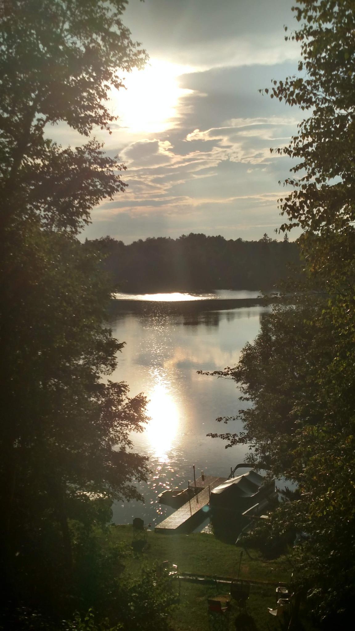 15_Dramatic_lake_dock_view_from_house_through_trees.jpg