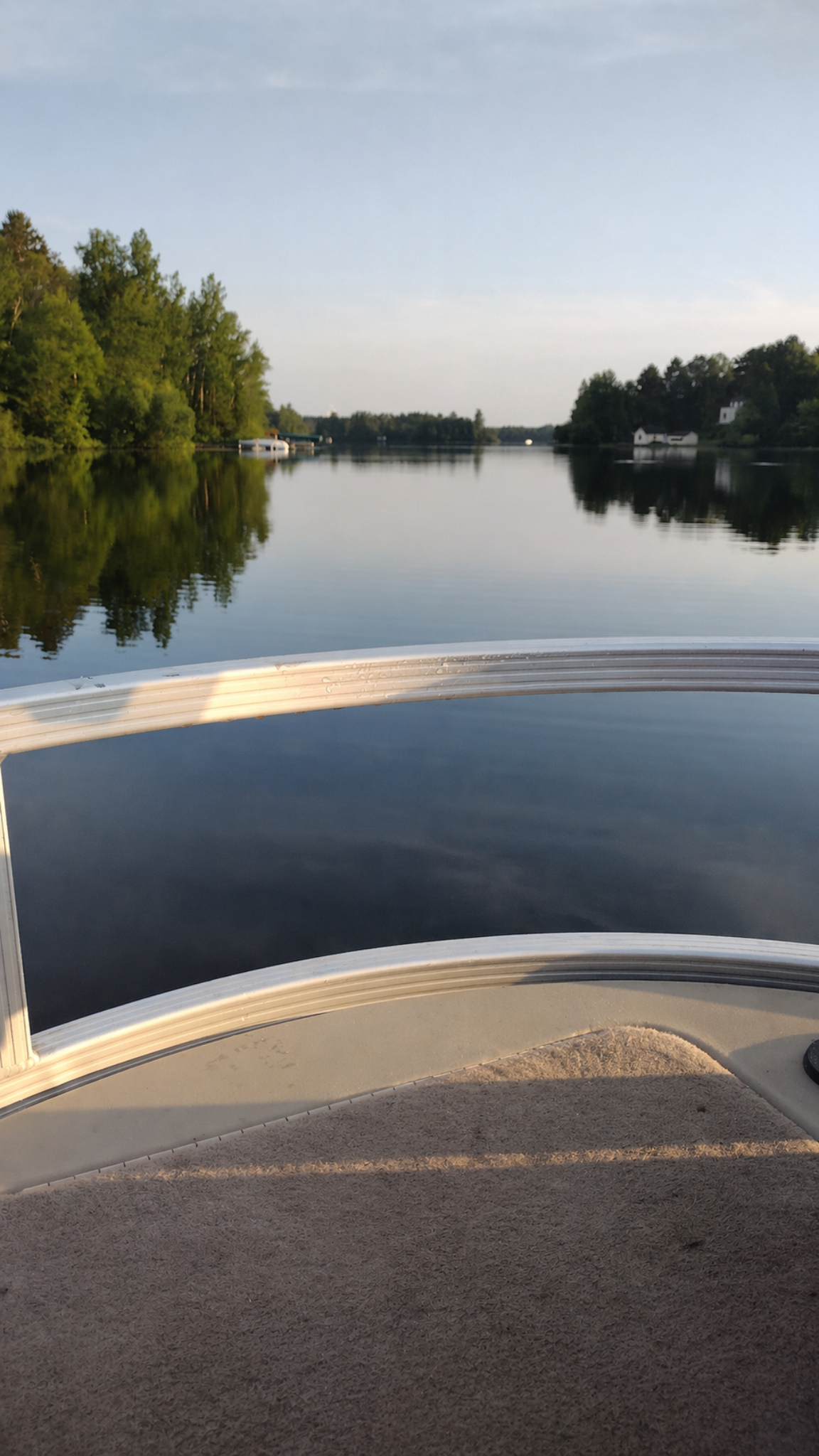04_Smooth_calm_lake_view_from_boat_pontoon___no_wine.png