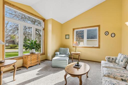 Sun-filled sunroom with an abundance of natural light.