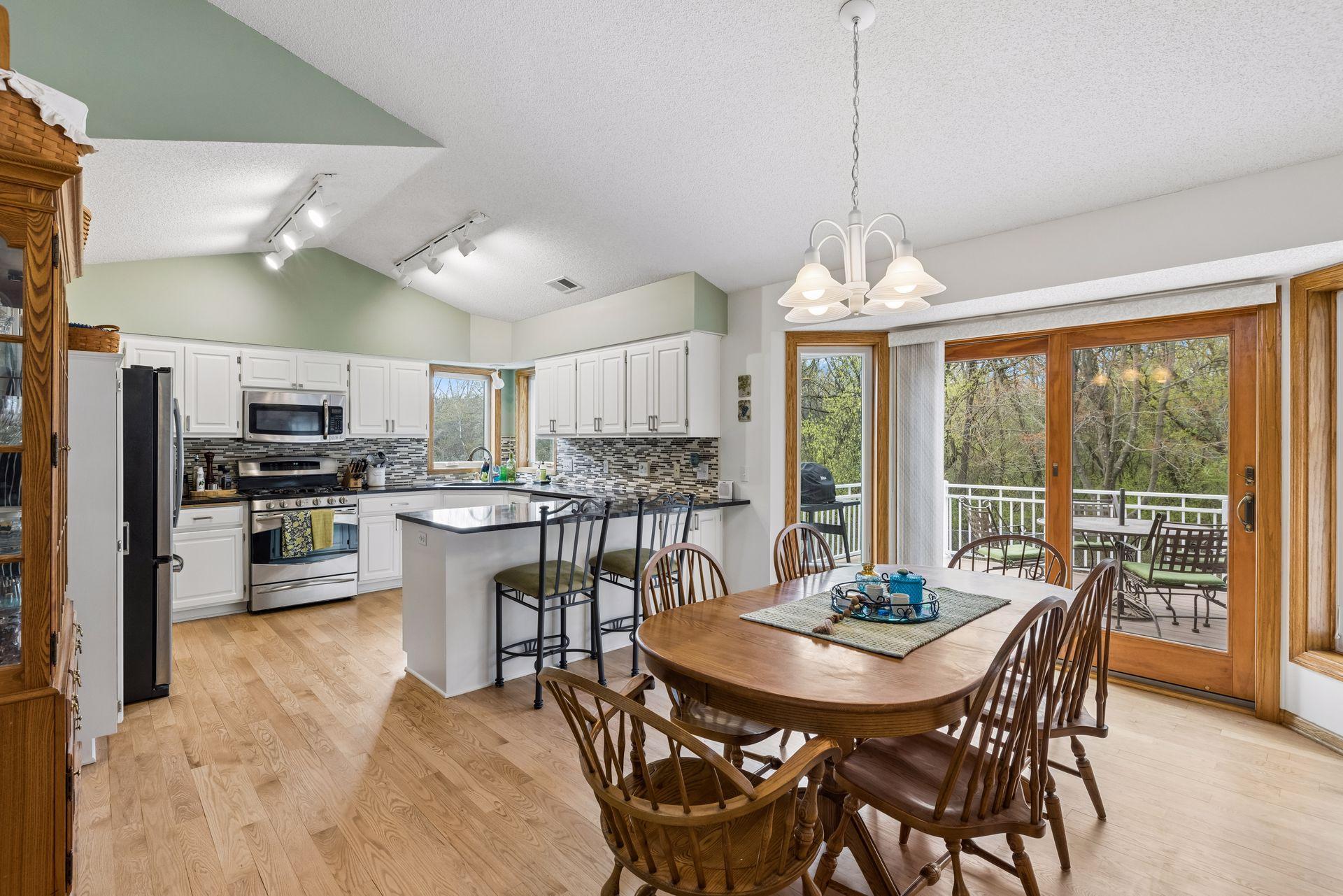 Kitchen with vaulted ceilings, creating an open and airy feel.