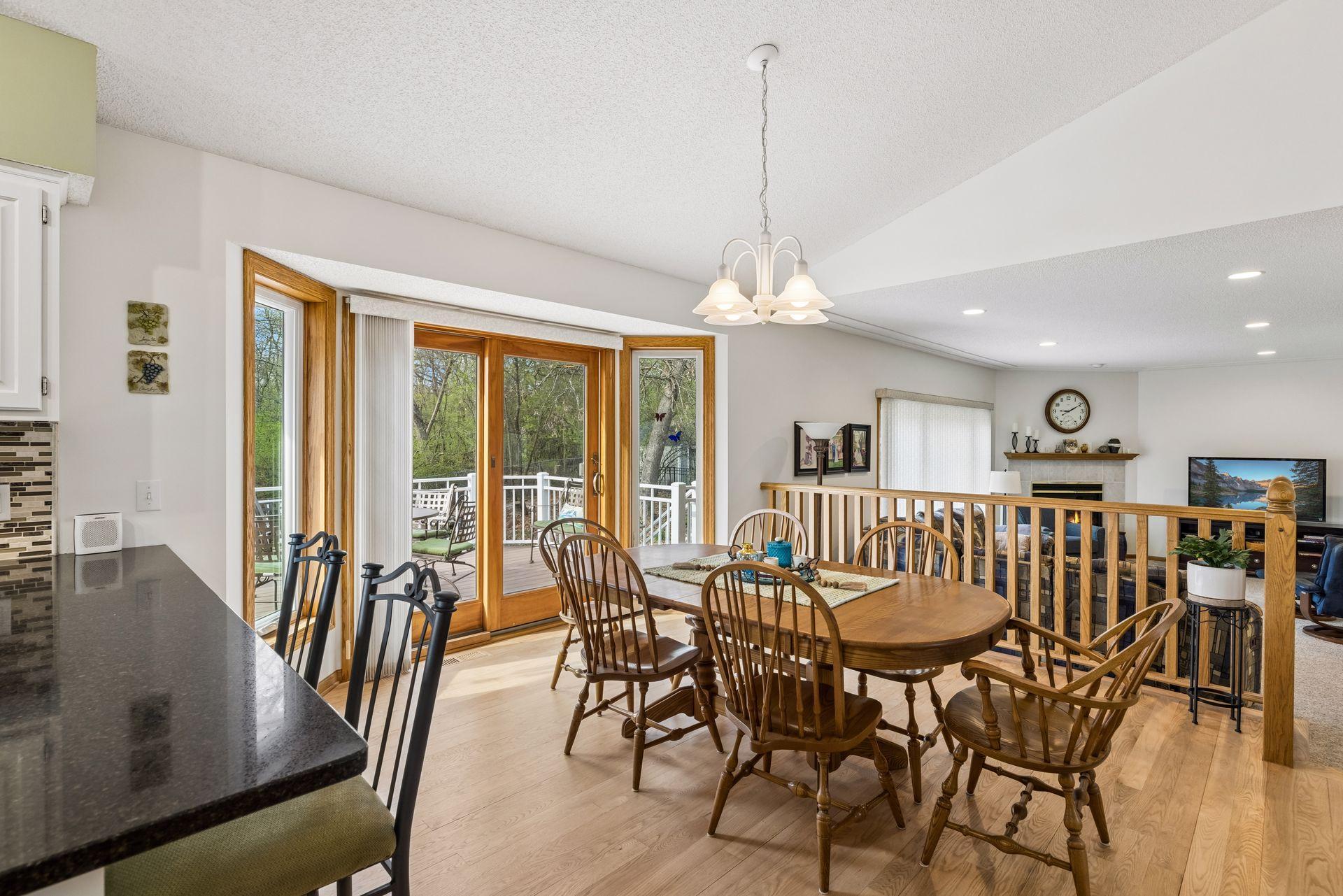 Dining area with walkout access to the maintenance-free deck—ideal for grilling.