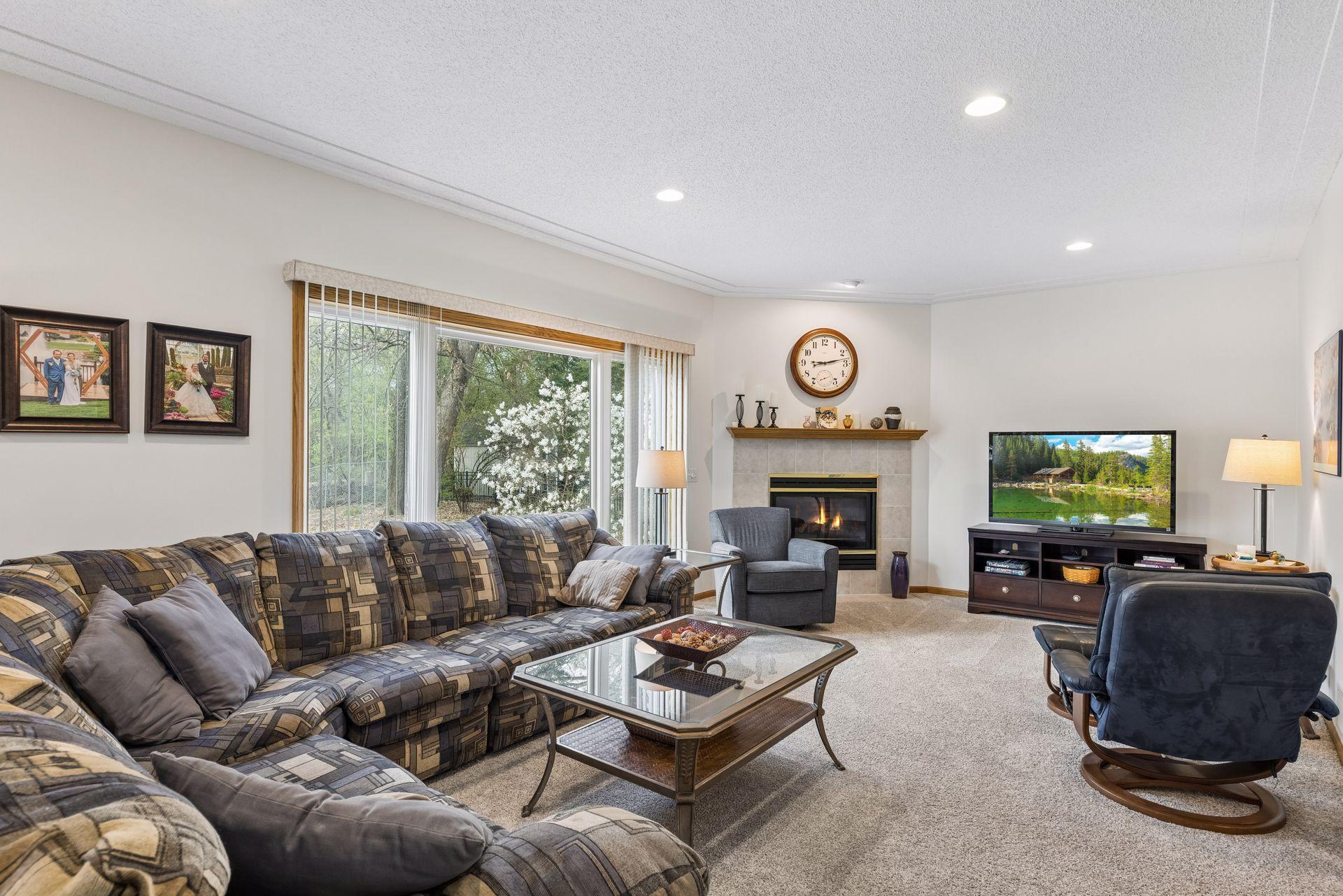 Cozy living room centered around a gas fireplace.