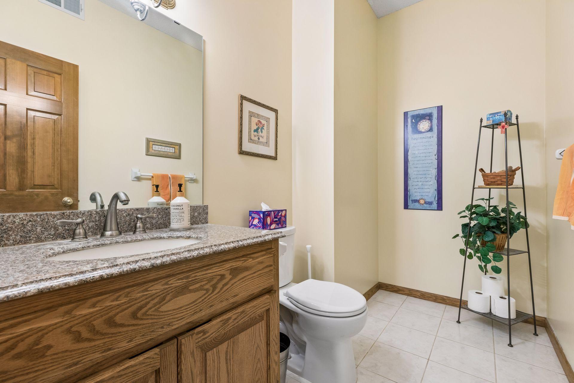 Main floor powder room, with plumbing in place for a future shower.