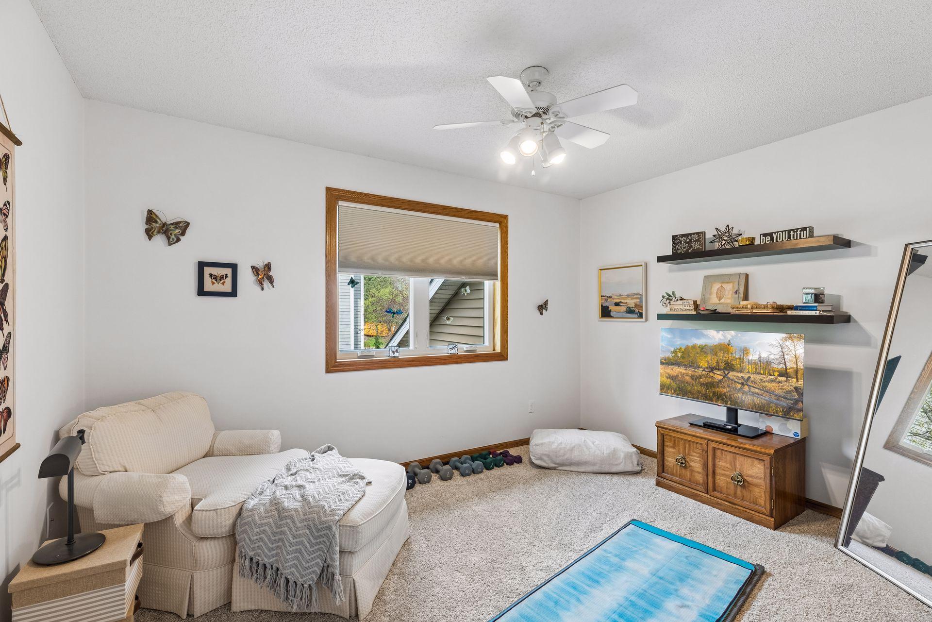 Bedroom #3, currently used as a yoga space.