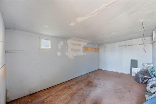 The 2 stall garage also has a workspace as well!