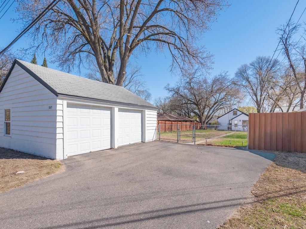 The extra-wide 2-stall Garage (with door measurements of 6'9"H x 8' W) and the asphalt driveway allow you to be worry-free by those bothersome snow emergency days!