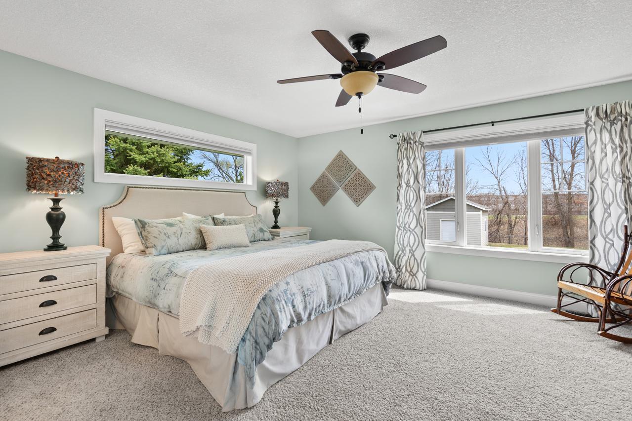 Privately situated primary bedroom, separate from the other rooms on this level.