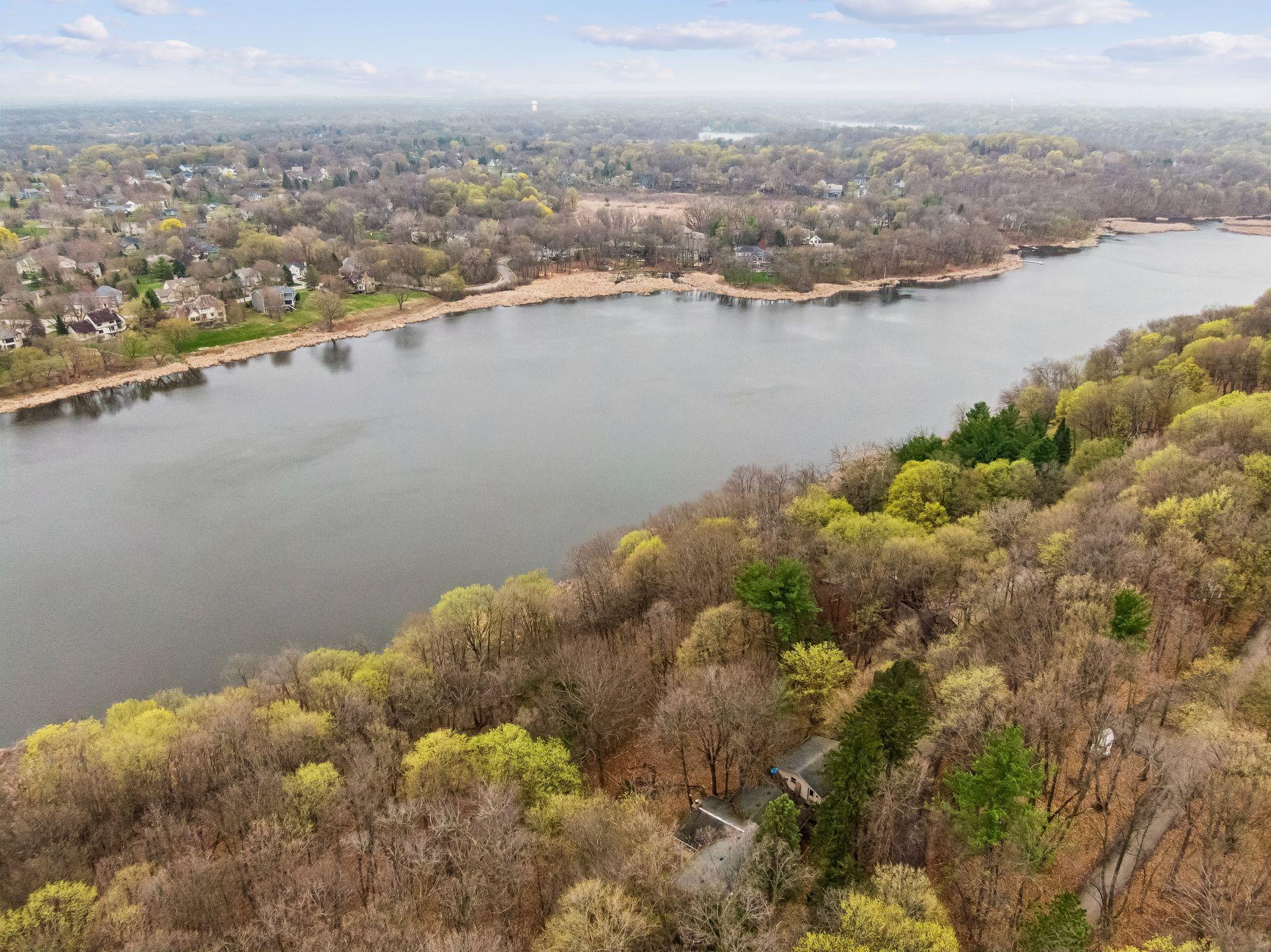 The property is perched on Ridge Road and surrounded by mature trees, an ideal setting for a spectacular estate. Located in the award-winning Minnetonka School District, this parcel offers the perfect balance of privacy and convenience.
