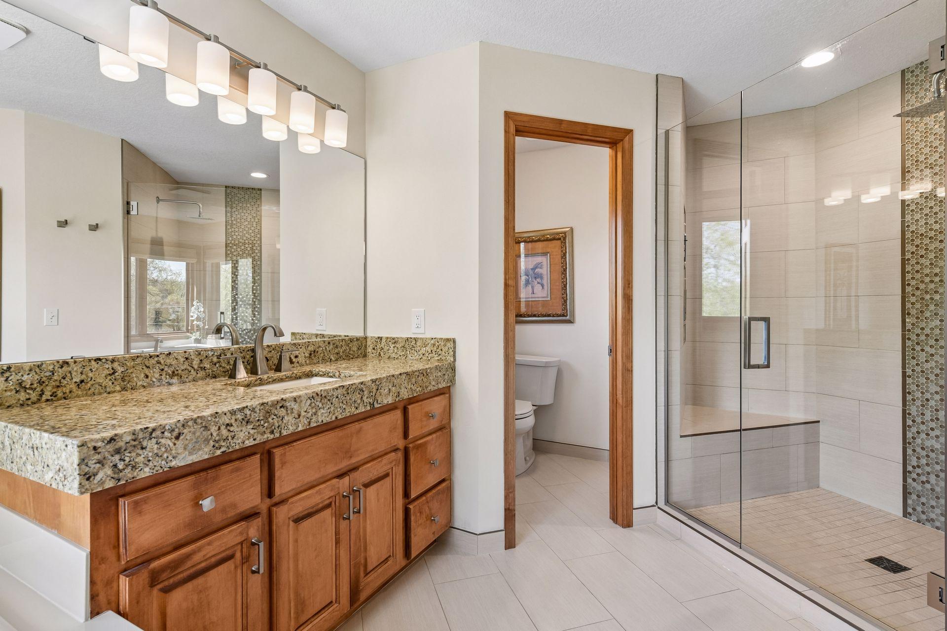 The Primary Suite includes His & Her walk-in closets with custom California Closet systems.