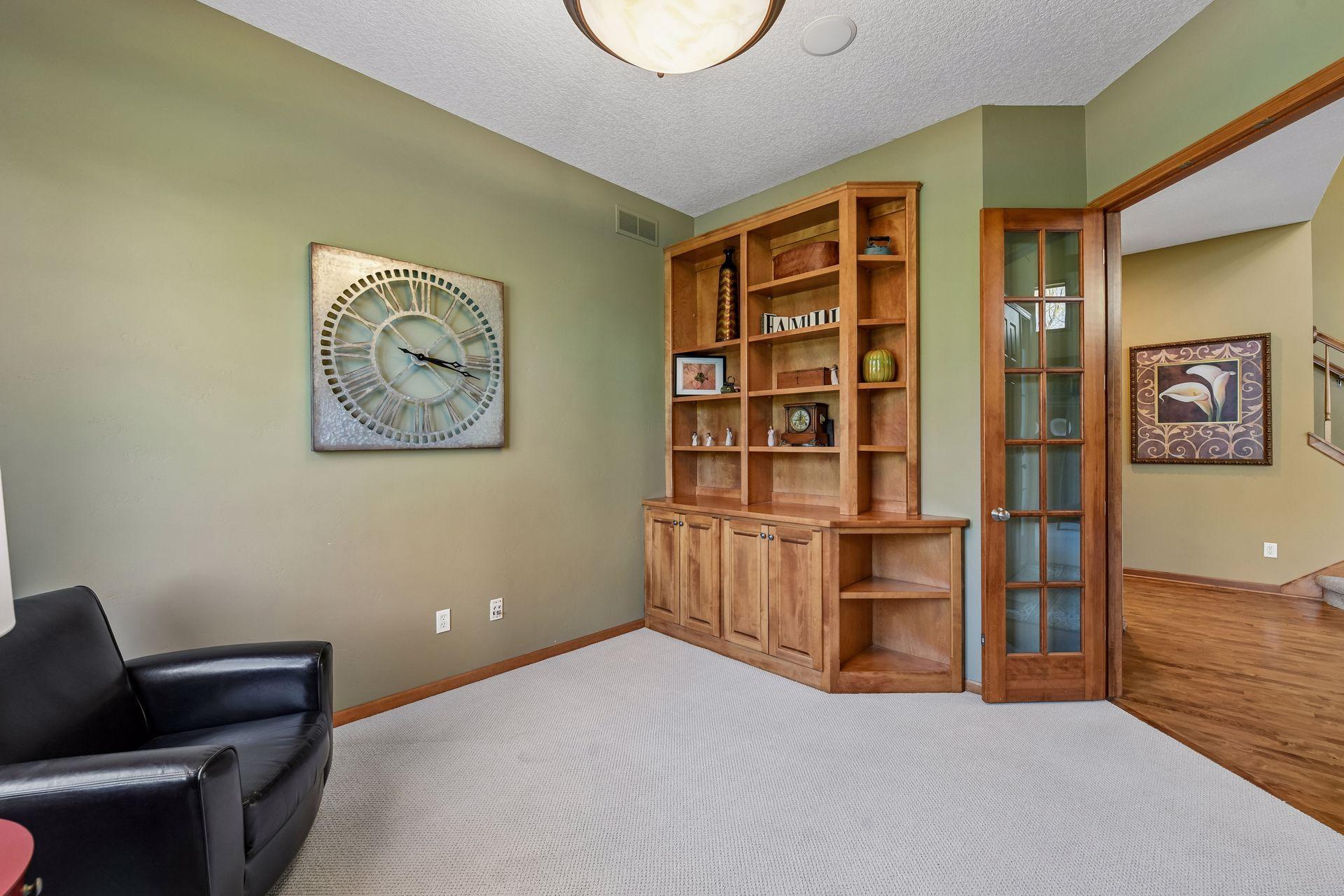 Tucked away behind 8' French doors is the main level home office.