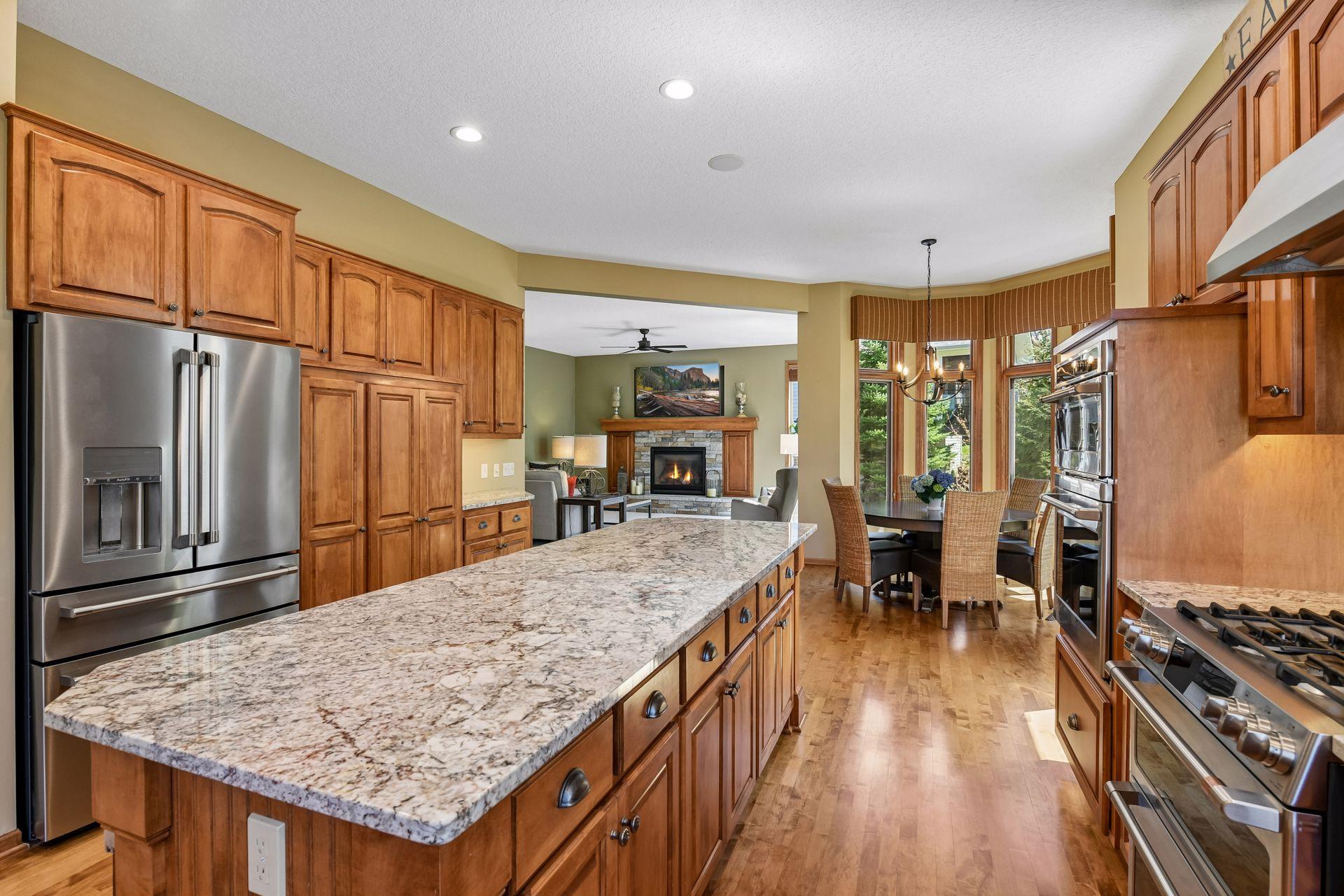 Enjoy GE Cafe series stainless appliances and a large island that seats six!