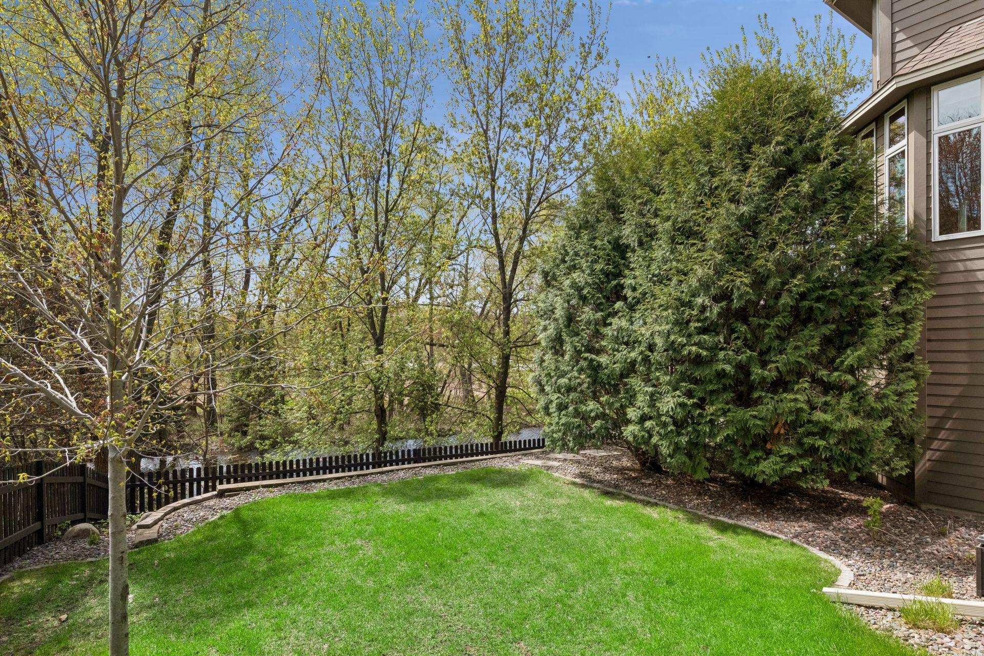 Fully fenced, the large yard offers plenty of room to play!