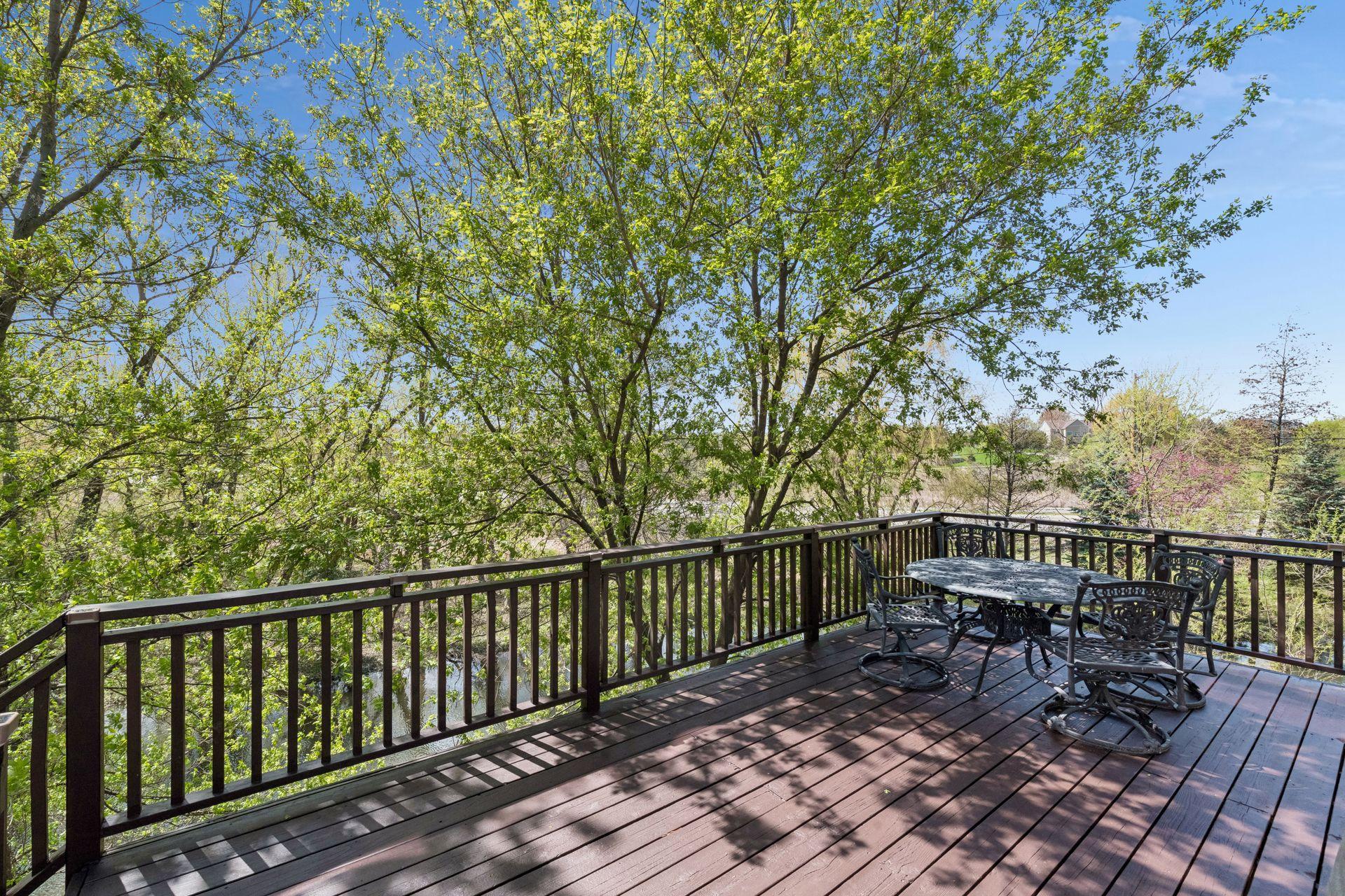 Towering trees surround the Deck creating a private setting to unwind with family and friends.