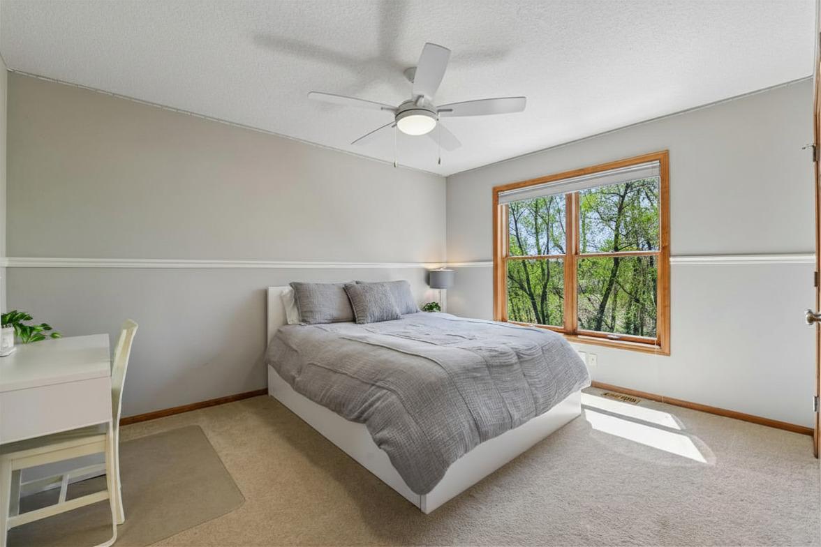 In addition to the Primary Suite, the upper level houses three Junior Bedrooms.