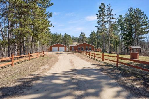 Inviting fence as you pull up your driveway