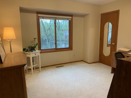 Bedroom 2 has backyard views and walk-in closet