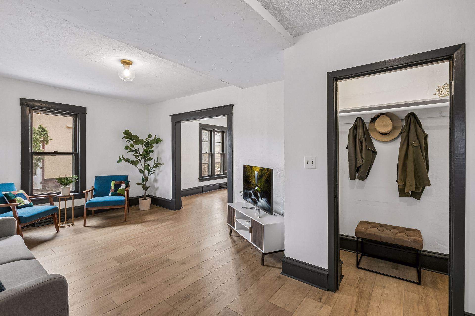 Bright Living Room w/ Coat Closet