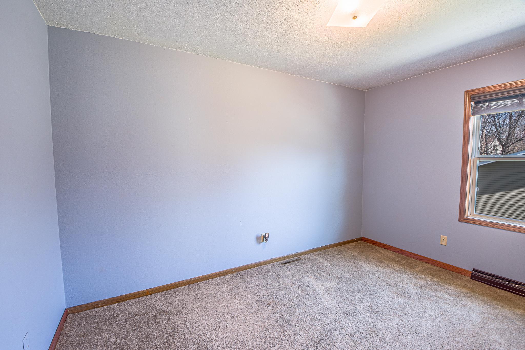 Another upper level bedroom.