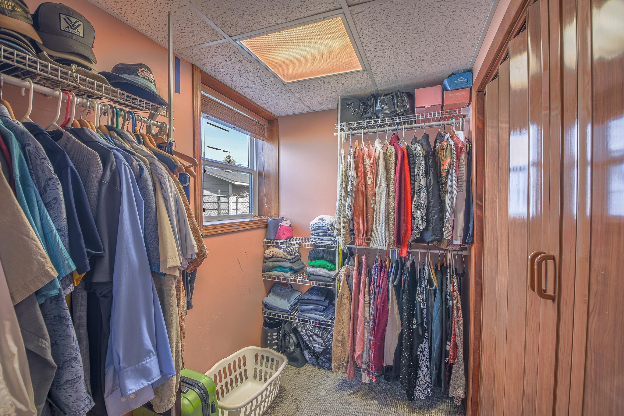 Large walk-in closet enhances the functionality of the primary bedroom.
