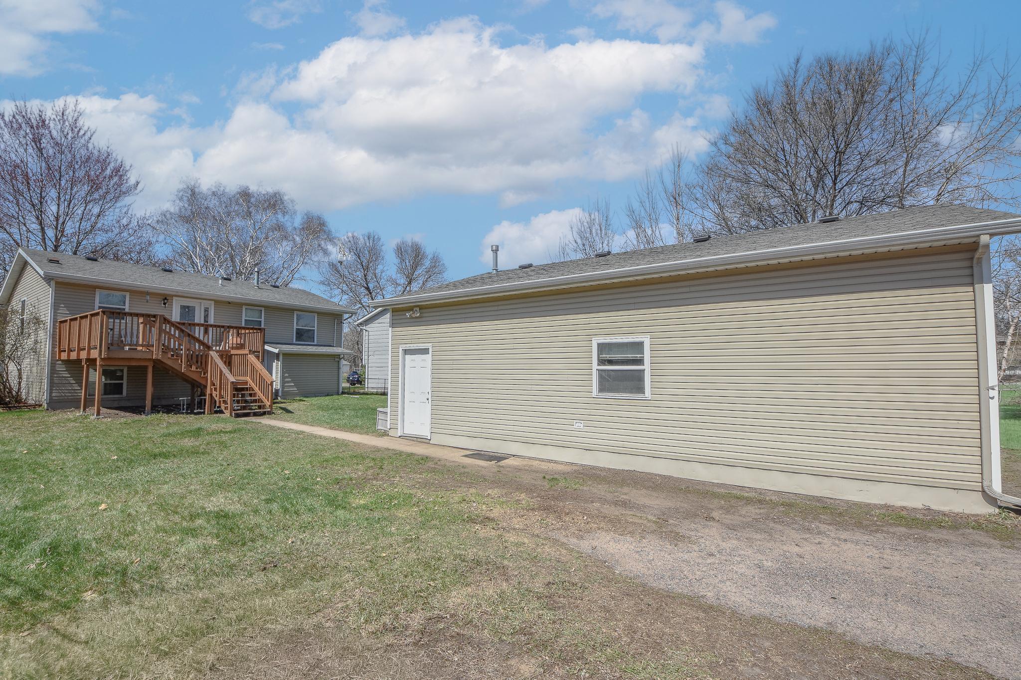 Service door lends access to garage.