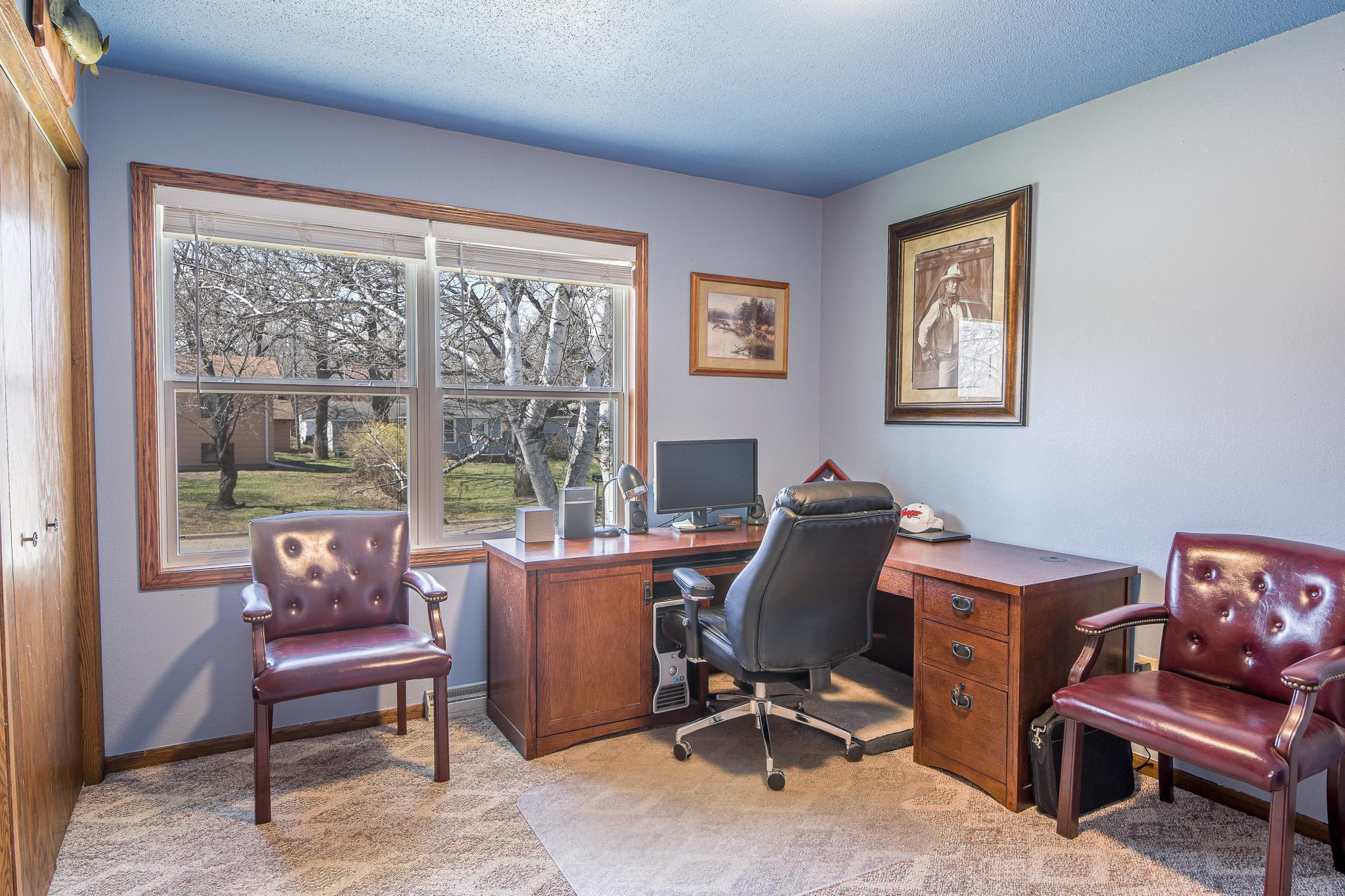 Upper level bedroom currently being used as a office space.