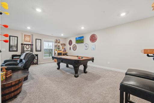 There are large spaces in this completely finished lower-level