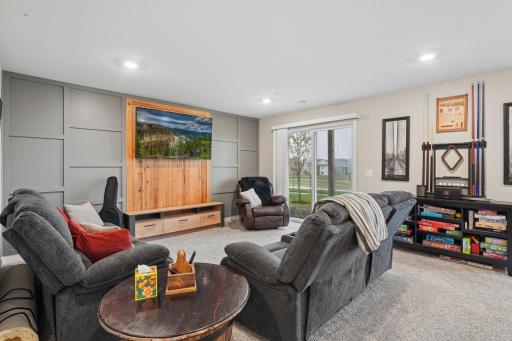 Lower-level walkout which features an attractive feature wall