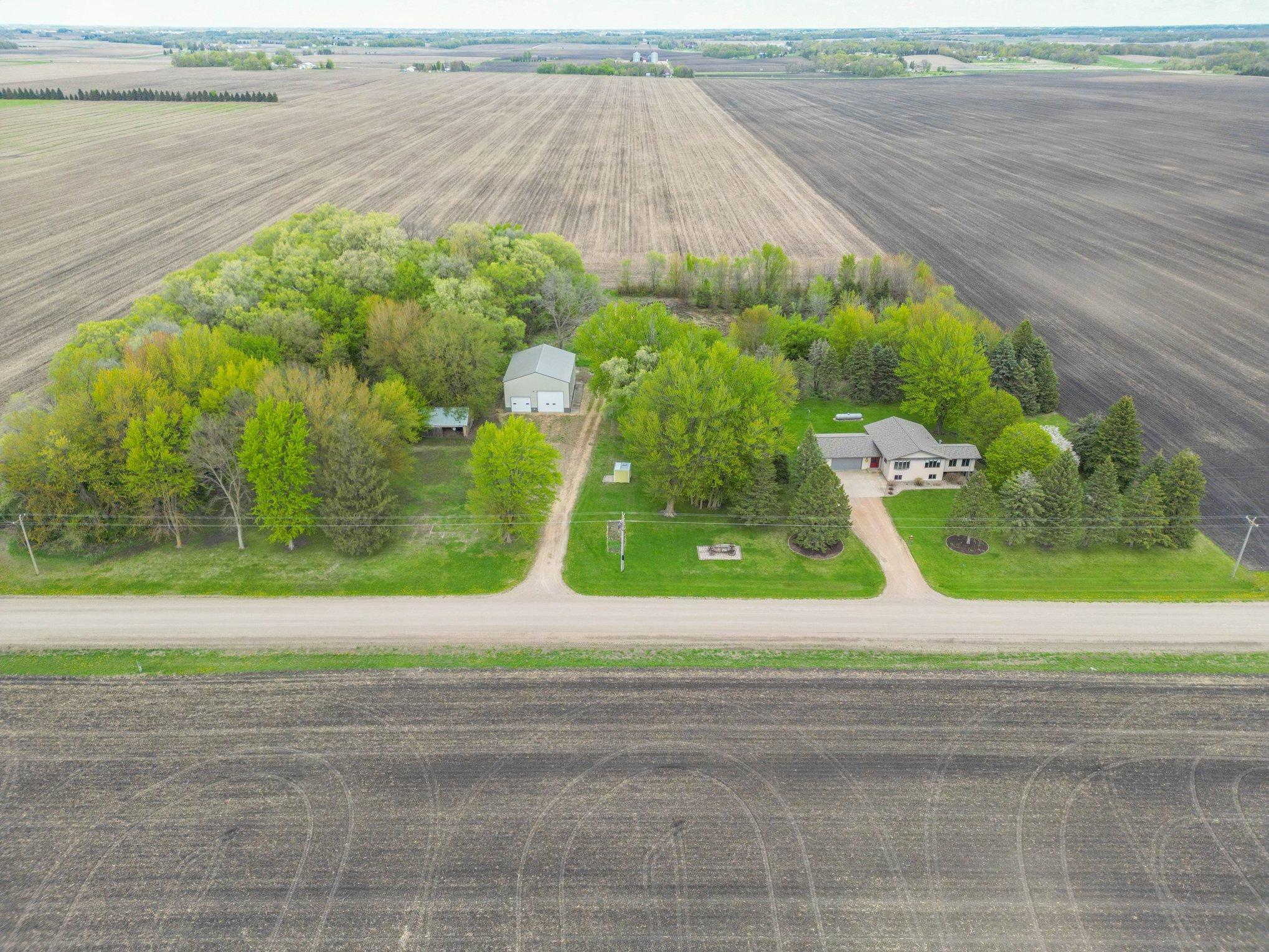 Private 7-acre country setting with home and impressive machine shed