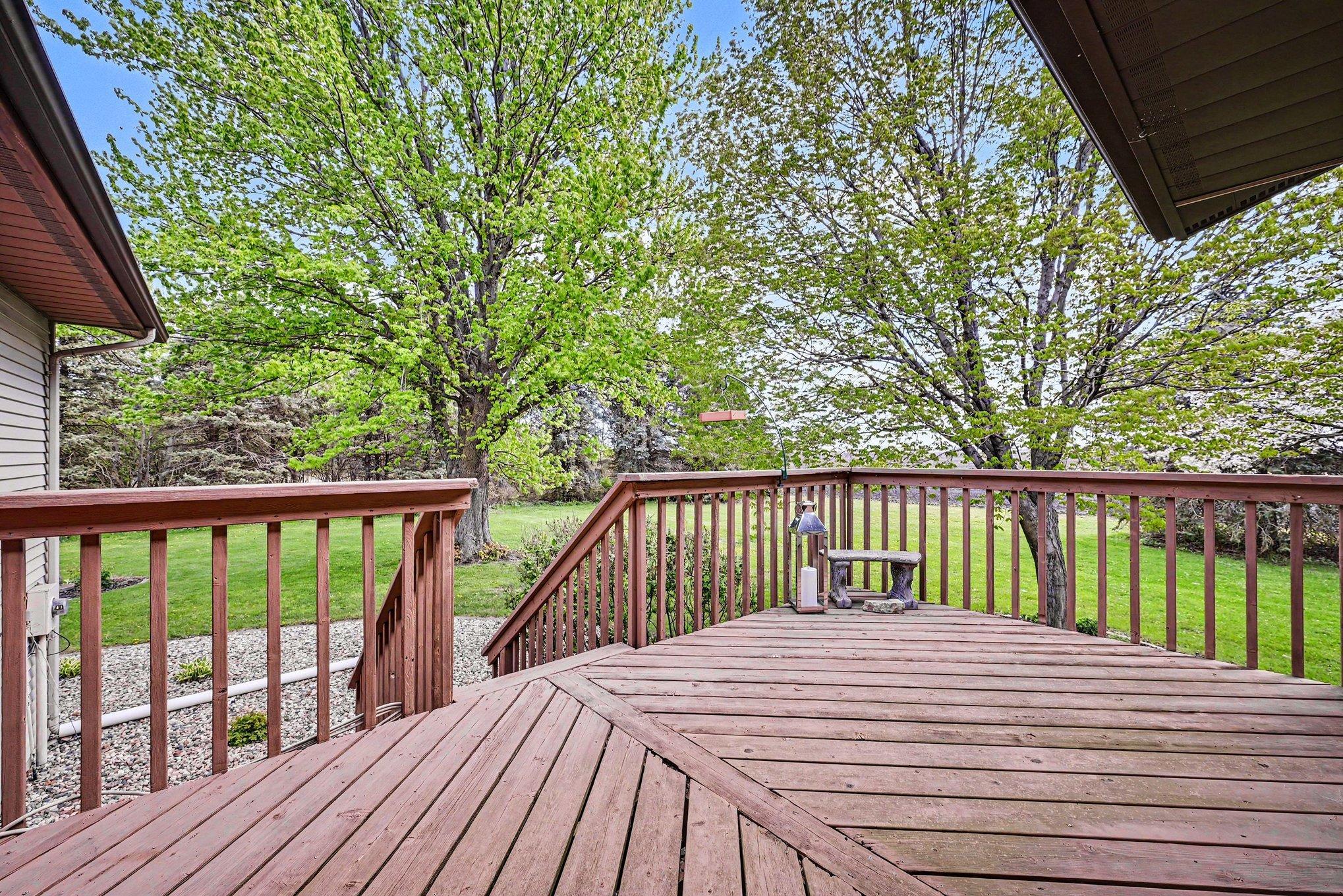 Back deck overlooking the yard and trees