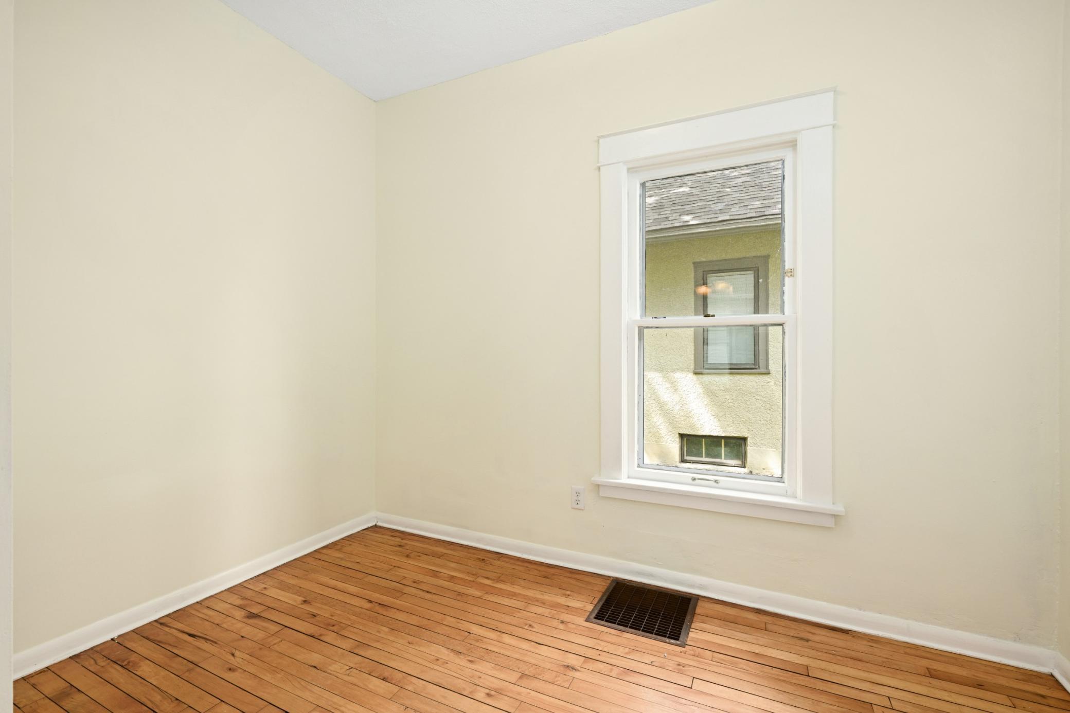 Second main floor bedroom freshly painted.