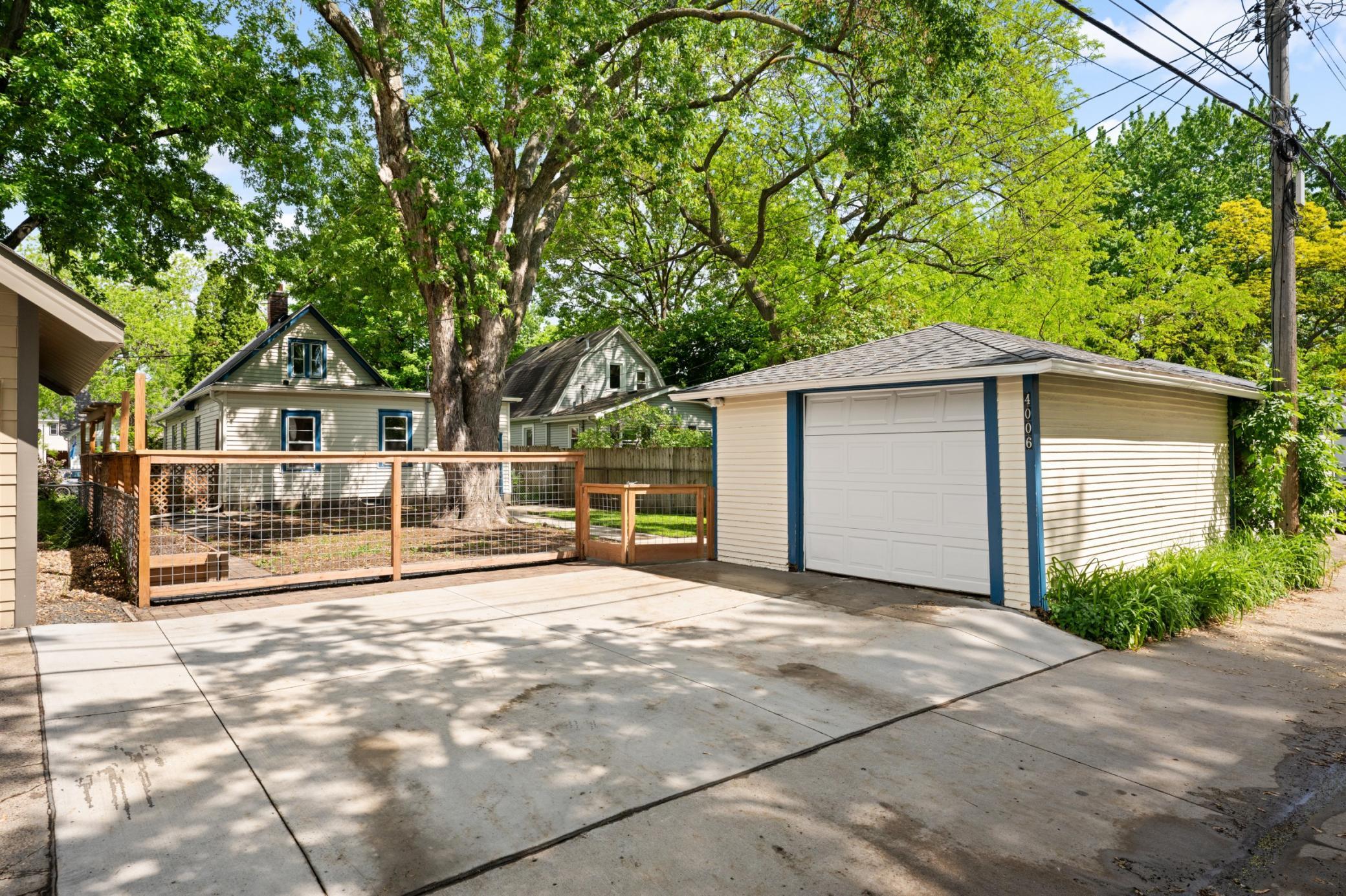 1-car garage with newer concrete driveway.