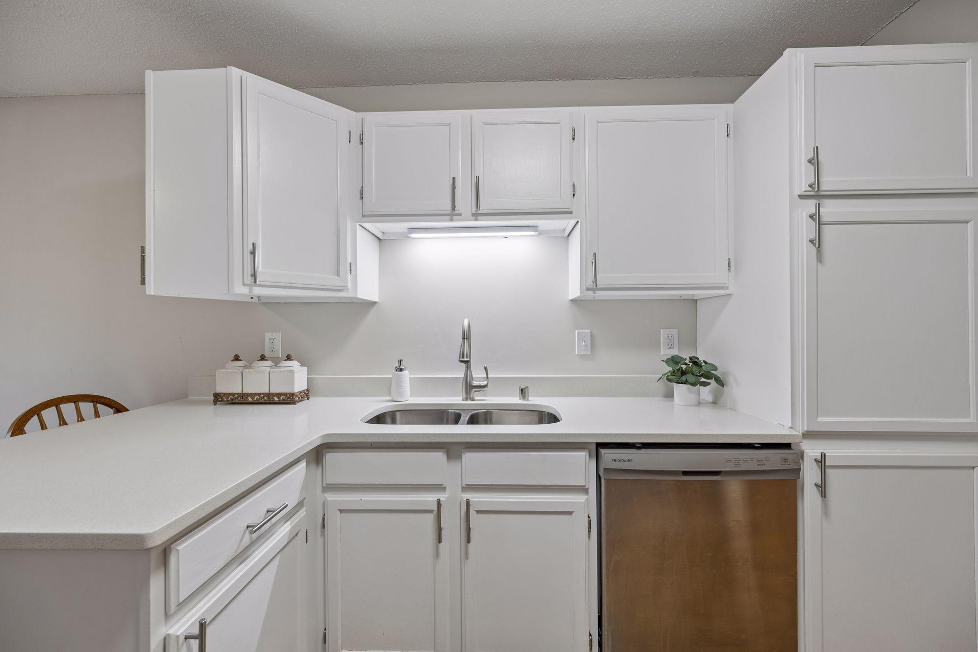 Sleek granite countertops throughout kitchen