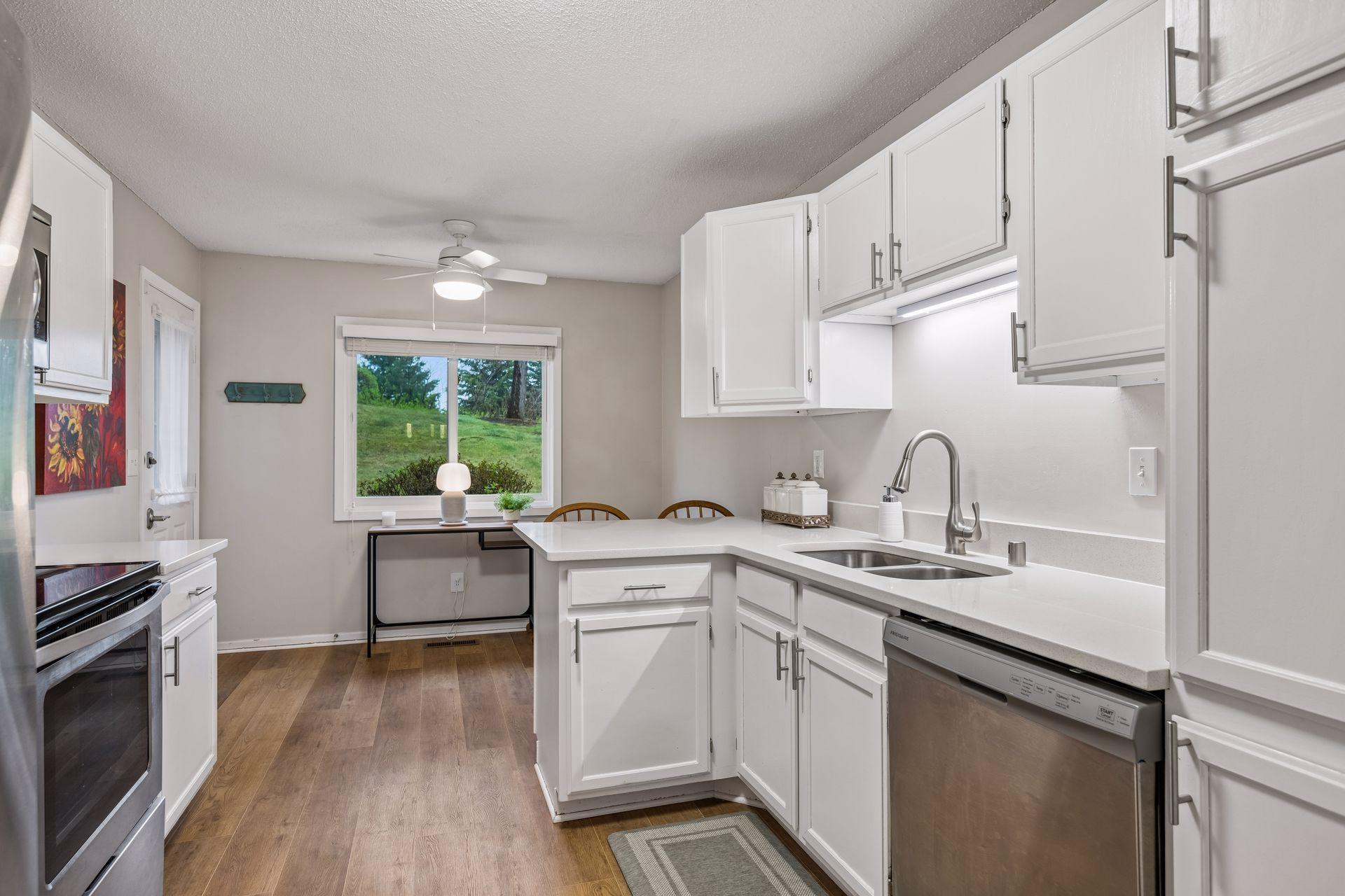 Stainless steel appliances throughout the kitchen
