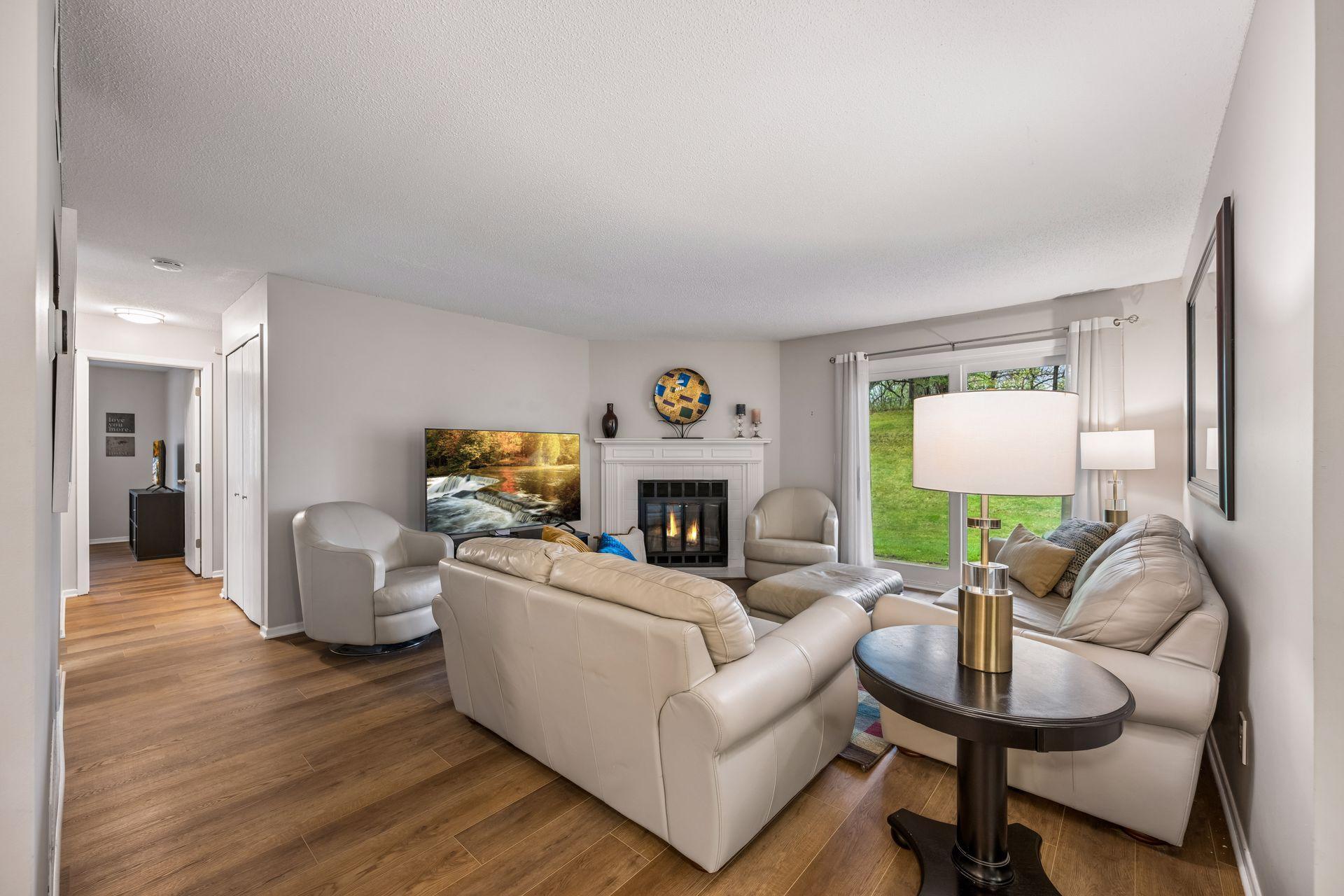 Spacious and bright living room that opens up to the private patio