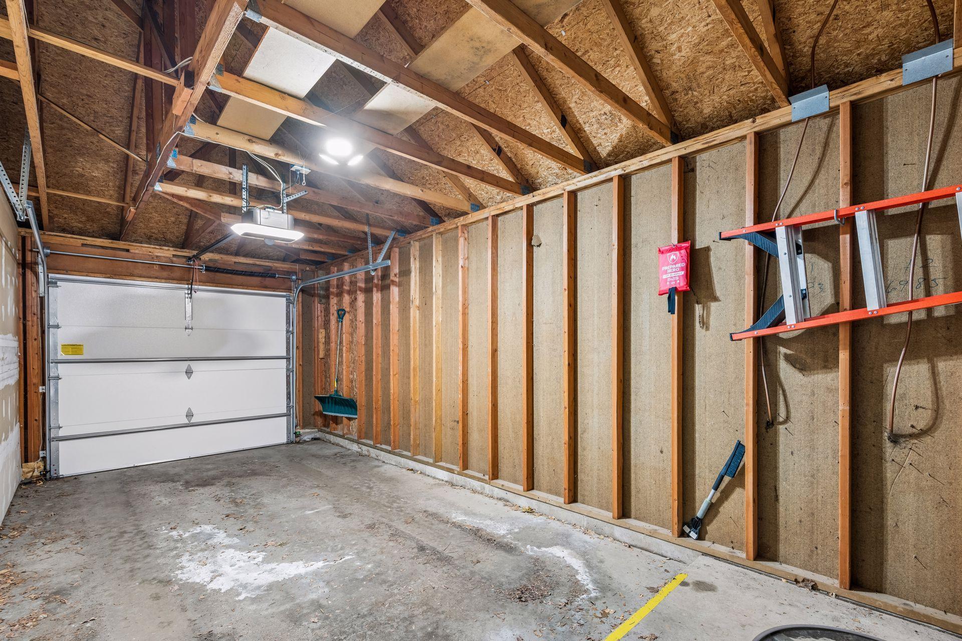 Garage stall #1 attached to building with direct access to condo entryway