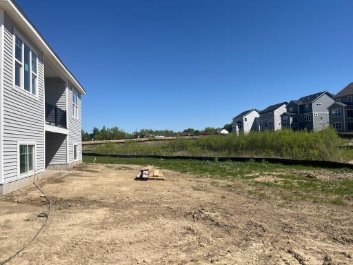 This is the back yard space you have been waiting for! With a covered veranda that overlooks a stunning pond view you have the ideal space to enjoy that morning cup of coffee along with the privacy you desire.