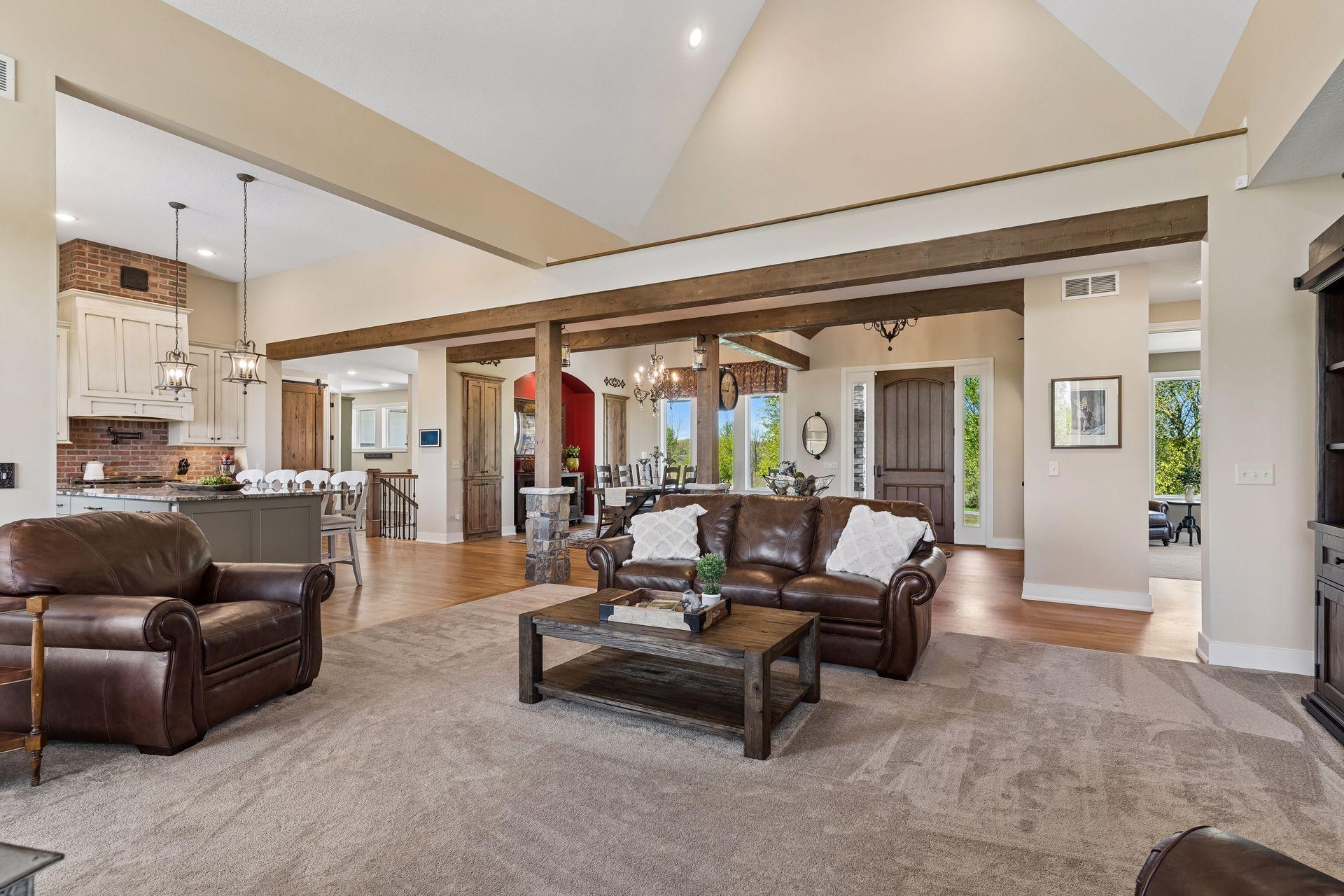 Designed for comfortable everyday living and effortless entertaining, the great room flows beautifully into the kitchen, dining, and entry spaces while maintaining a spacious yet inviting feel.