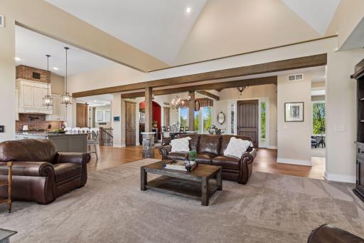 Designed for comfortable everyday living and effortless entertaining, the great room flows beautifully into the kitchen, dining, and entry spaces while maintaining a spacious yet inviting feel.